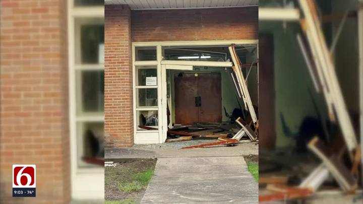 Driver crashes into Tulsa Catholic school overnight, damaging building