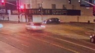 Video shows deputy running red light, crashing into building