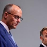 France, Germany vow to up pressure on 'ogre' Putin