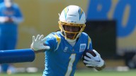 Chargers WR Quentin Johnston leaves on a cart after a scary hit