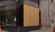 Storm damage in Livingston County, historic Howell opera house window destroyed
