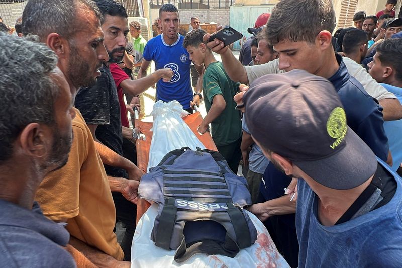 Israel hits Gaza hospital, killing at least 20 people, including five journalists