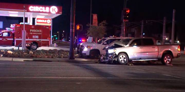 2 officers, driver hospitalized after crash in north Phoenix