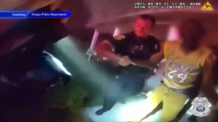 Crews pull man from burning home in Tampa