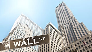 Dow Jones rebota apoyado en los resultados y finalizará la semana con saldo positivo