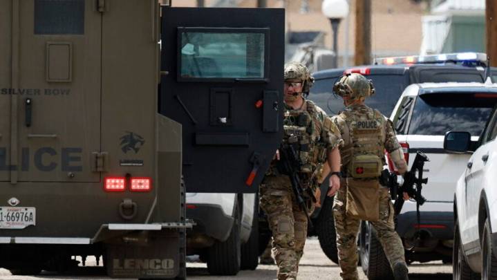 Officials scour mountainous area of Montana for ex-US soldier suspected of killing 4 in bar shooting