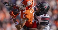 Clemson star WR Antonio Williams taken to the locker room after limping off field vs. LSU