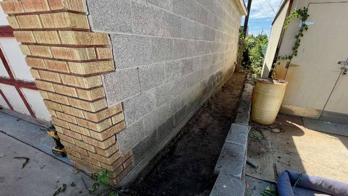 Explosive materials safely removed after being found buried outside Washington Terrace home