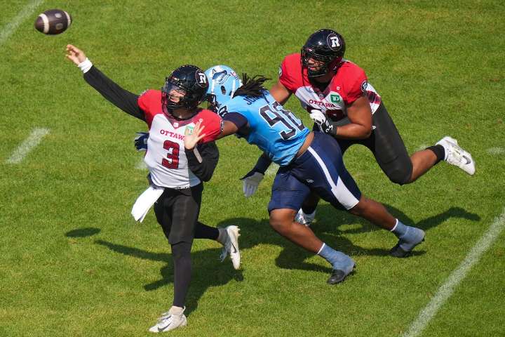 Brown’s five TD passes power Redblacks past Argos