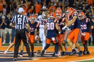 Beatty returns punt for TD, breaks Grange's nearly 102-year-old mark in No. 12 Illini's opening rout