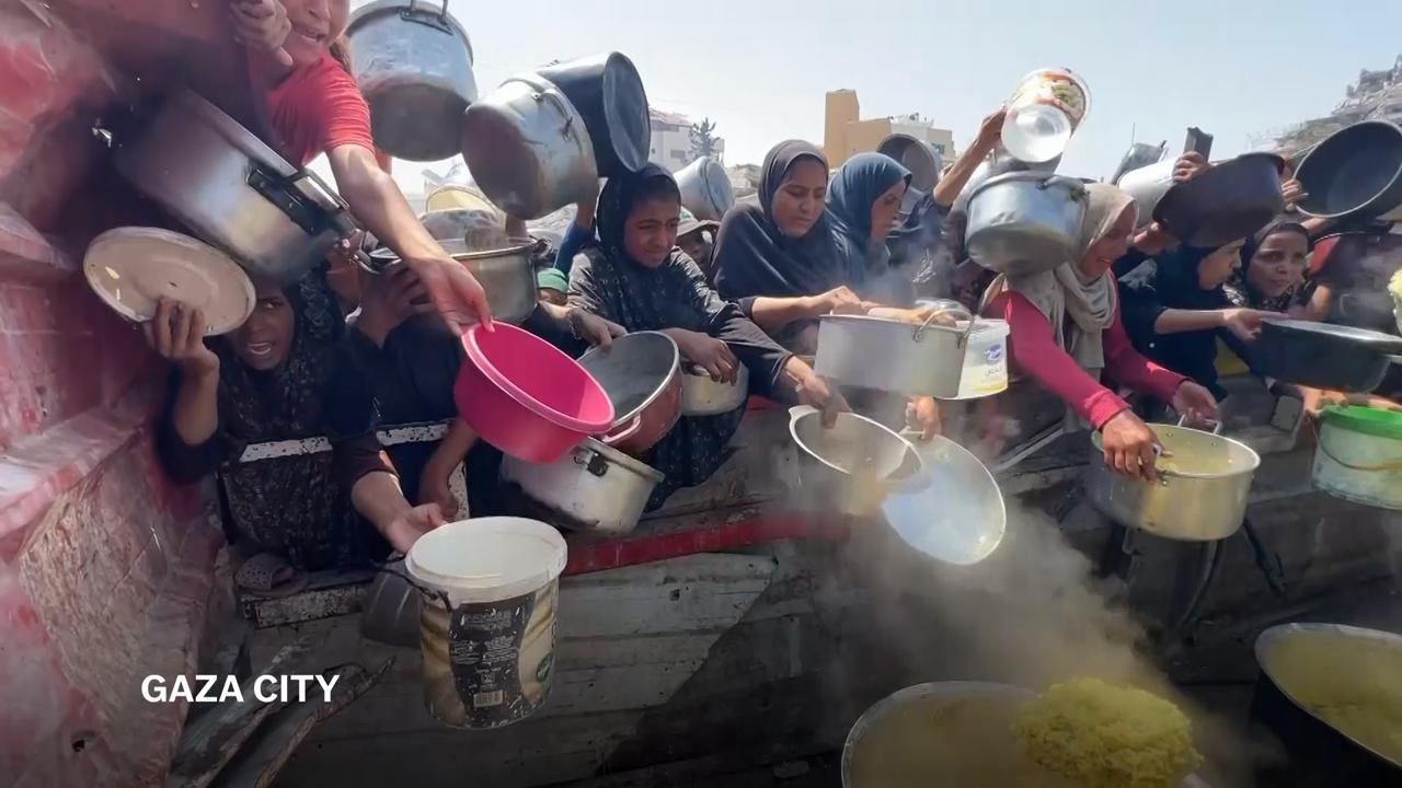 Palestinians gather at charity kitchen in Gaza City amid ongoing food shortages