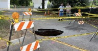 Sinkhole forms near Heritage Landing Drive under Veterans Bridge; road blocked