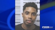 Mobile man accused of throwing object at police car