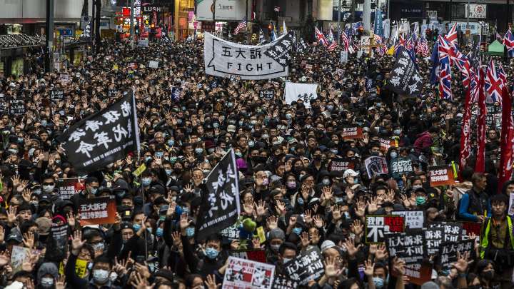 Hong Kong police warrants are an 'act of transnational repression'