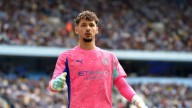 Man City's Guardiola backs keeper Trafford after Spurs error
