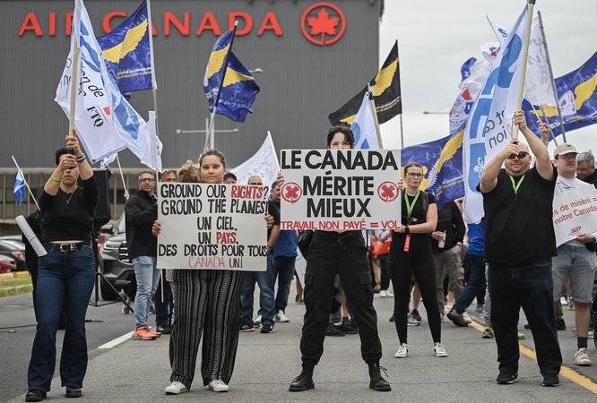Air Canada passengers still scrambling to rebook as labour dispute grounds flights