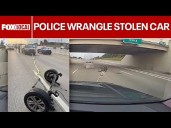 DASHCAM: Police wrangle stolen car, rip axle from vehicle