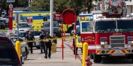 Police say 3 dead in shooting at a Target store and a suspect has been detained
