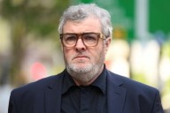 Brother of Oasis' Liam and Noel Gallagher in UK court on rape charge
