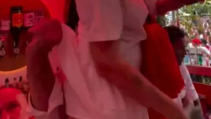 'French rugby legend' filmed lifting up skirt of influencer while sitting underneath her during festival