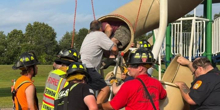 PHOTOS: Connecticut officials rescue man stuck in playground slide