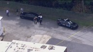 Man describes moment he says woman was found naked, shot to death inside storage unit behind shopping plaza