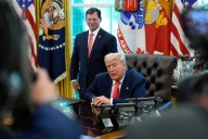 The Latest: Dozens arrested in Washington as White House ratchets up federal police presence
