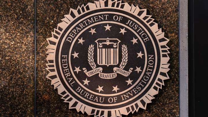 Senior FBI official who resisted Trump administration demands is pushed out, AP sources say