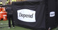 Not simply some silly bathroom joke. What's behind 'Depend' tent on CU sideline