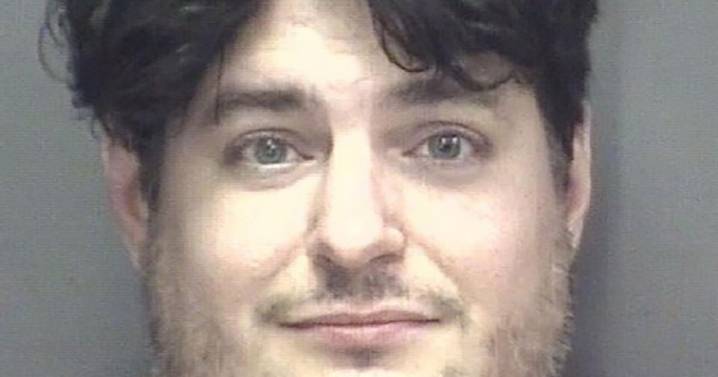 Standoff suspect waved firearm at neighbors in recent incident, according to complaint