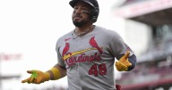 Cardinals seize on Reds error in 10th inning to overcome their missteps in 7