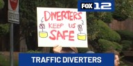 Advocates rally to protect traffic diverters city plans to remove in NW Portland