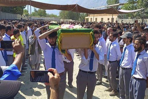 Massive mudslide kills 7 volunteers repairing flood damage in northern Pakistan