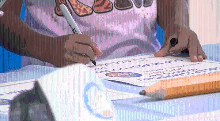 Kindergarten students kick off school year with ‘signing day’ 