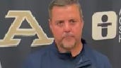 Zips soccer coach Jared Embick talks after a win Aug. 24, 2025