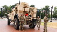 National Guard vehicle collides with civilian car near US Capitol, trapping one person