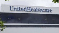 Stocks making biggest moves midday: UNH, AMAT, SNDK, CSCO, EVLV, FLO