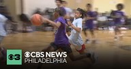 Philadelphia police officers build connections with youth at basketball game