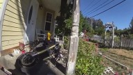 Convicted felon faces charges after motorcycle crashes into Pierce County home