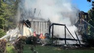 4 children and 2 adults are killed when fire rips through a house in Maryland