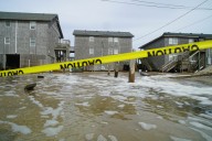 Hurricane Erin stirs up strong winds and floods part of a NC highway as it slowly moves out to sea Updated 2 hours ago