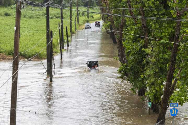 Hurricane Erin weakens to Category 3 as forecasters warn of storm's rapid growth