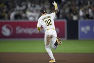 Sheets hits 2 of San Diego's 4 homers, Tatis robs Devers as the Padres beat the Giants 8