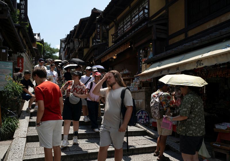Japan should debate cap for foreign residents, government report says