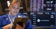 Stocks inch higher on Wall Street and hold on to weekly gains
