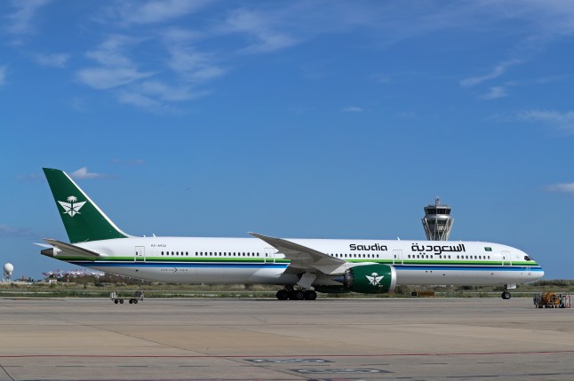 Police raid Heathrow flight after passenger ‘tried to hit crew and open plane door’