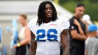 Lions' Morice Norris taken off in ambulance after injury against Falcons