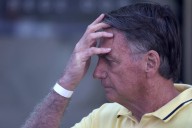Judge in Brazil lets Bolsonaro temporarily leave house arrest for medical exams
