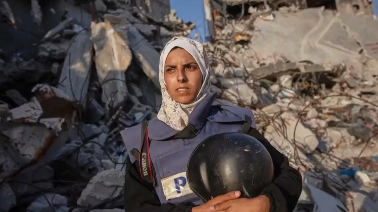 'She was loved by everyone': Father of journalist killed by strike in Gaza pays tribute to daughter