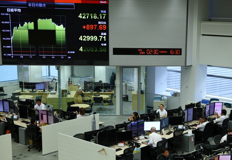 Asian shares rise, dollar defensive after mild inflation data